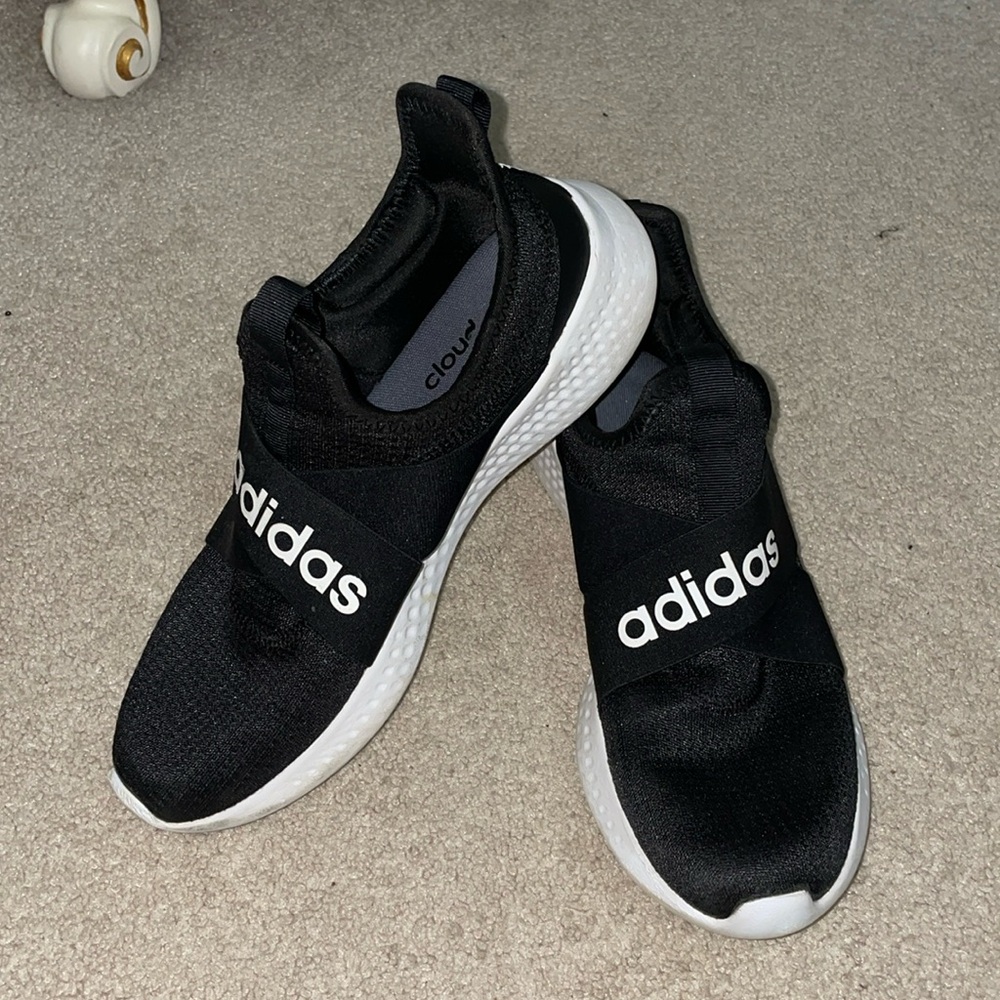 Black adidas slip on tennis shoe